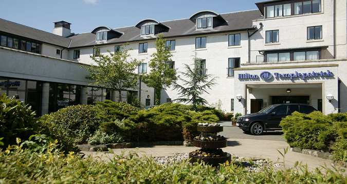 Tee off at the Hilton Templepatrick Hotel & Country Club?s woodland golf course